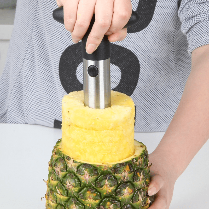 Stainless Steel Kitchen Tools for Slicing, Peeling, And Cutting Pineapples.