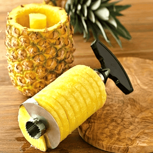 Stainless Steel Kitchen Tools for Slicing, Peeling, And Cutting Pineapples.
